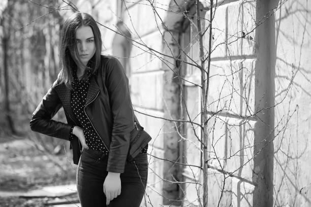 istock Girl on a walk through the spring city 1163331817