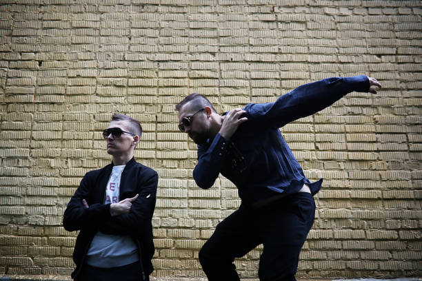 istock Two men in sunglasses 1163333181