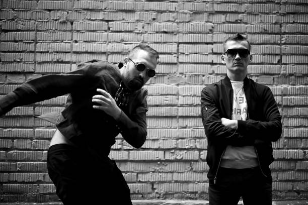 istock Two men in the street black and white 1163333215