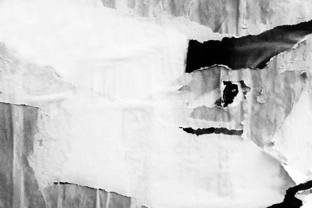 istock Blank white black old ripped torn paper crumpled creased posters grunge textures backdrop backgrounds placard 1163334189