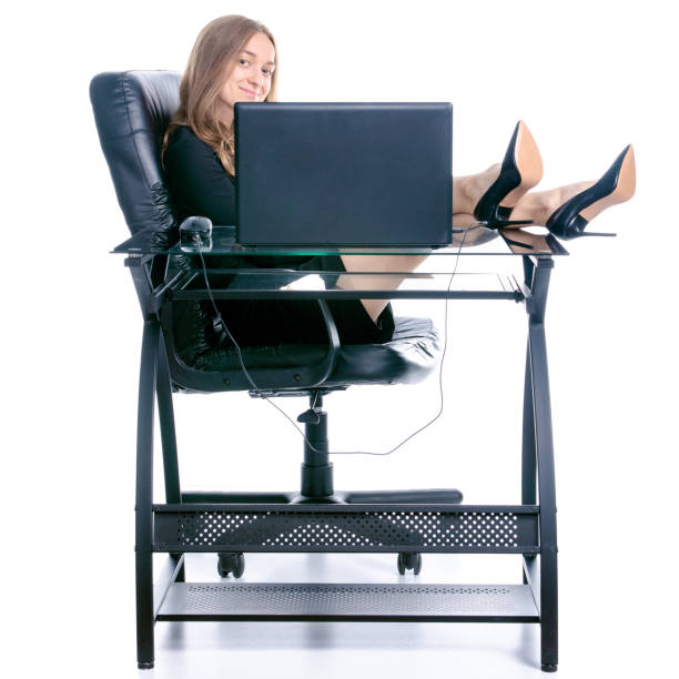 istock Beautiful business woman smile sitting at the table working using laptop looking at screen, hand writing, smiling 1163334191