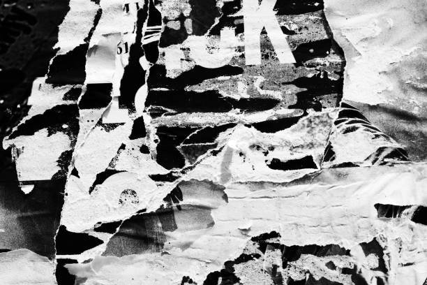 istock Blank white black old ripped torn paper crumpled creased posters grunge textures backdrop backgrounds placard 1163335267