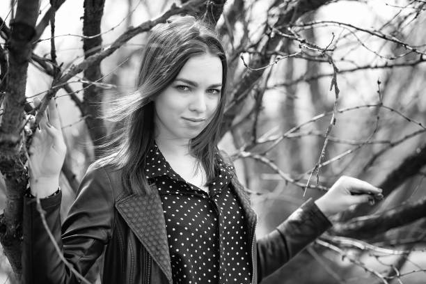 istock Girl on a walk through the spring city 1163335594