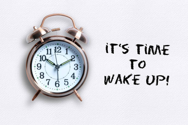 istock classical copper colored alarm clock with bells in a Wake Up concept 1163335795