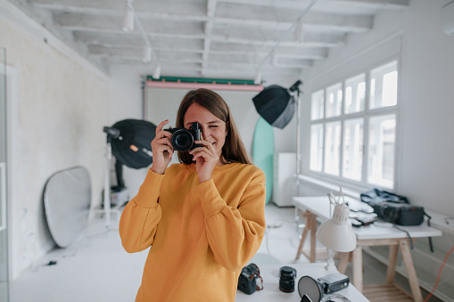 Photographer working in a studio
