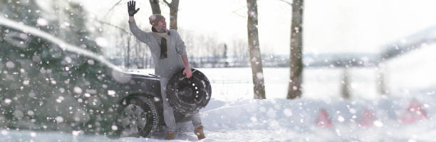 istock A man near a broken car on a winter day 1163337844