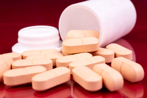 istock Pharmaceutical industry drugs pills vitamins bottle 1163338671