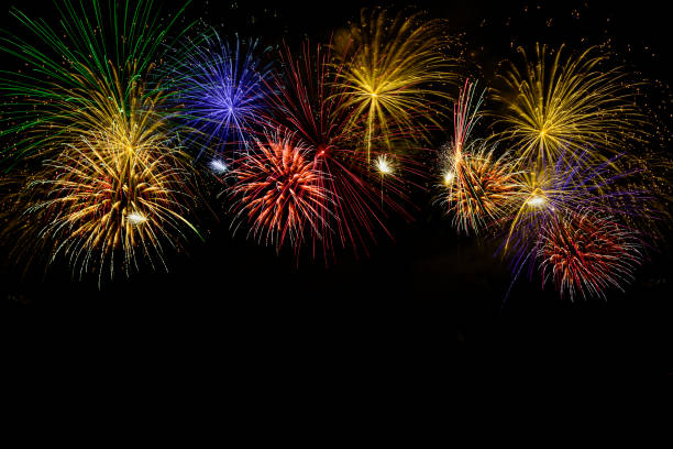 istock Colorful fireworks celebration and the midnight sky background. 1163340977