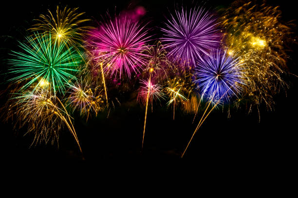 istock Colorful fireworks celebration and the midnight sky background. 1163340980