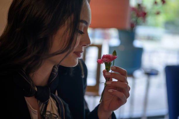 istock Woman with flower 1163341191