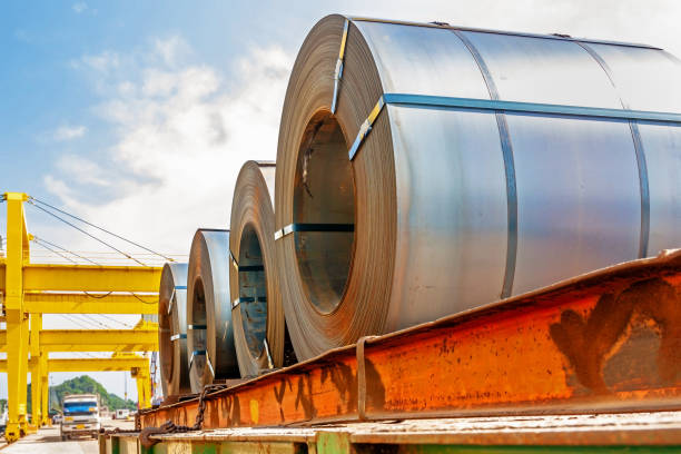 Steel coil transport Steel coil transportation at port curled up stock pictures, royalty-free photos & images