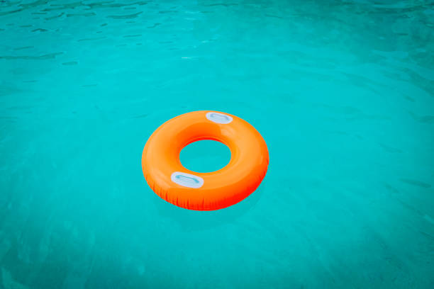 istock kids floatie in the pool, water safety and summer fun 1163345120