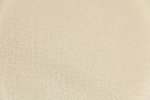 istock sandy textured textile background, small diagonal depth of field 1163346844