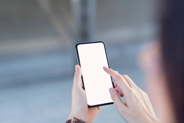 istock Hand holding smartphone blank screen on isolated. Take your screen to put on advertising. 1163347007