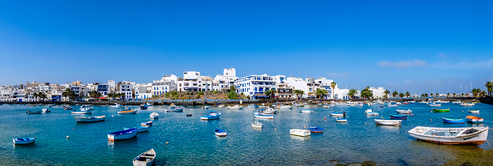 Boats moored at the Charco de San Ginés, a sea water inlet that penetrates the city of Arrecife, the capital of the island of Lanzarote.
