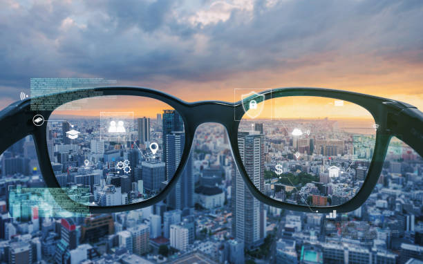 Smart glasses, VR virtual reality, and AR augmented reality technology. Smart glasses looking at the city with graphic hologram