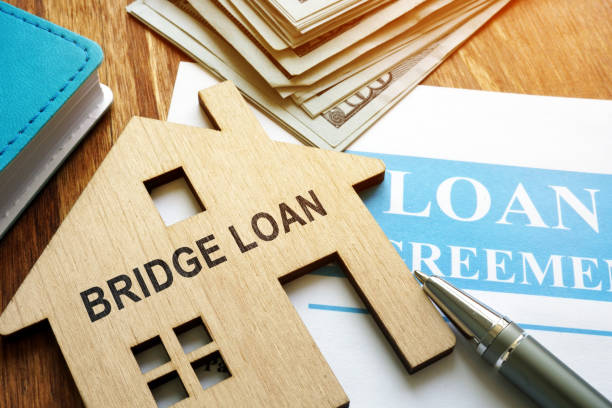 istock Bridge loan and mortgage agreement with pen. 1163347403