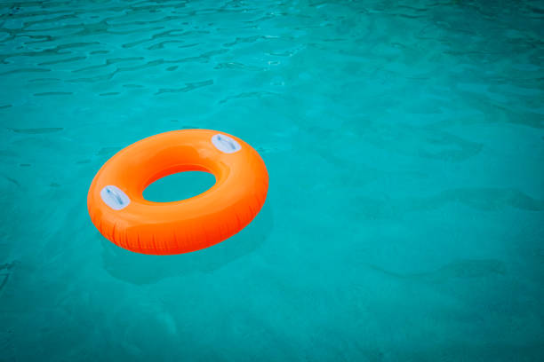 istock kids floatie in the pool, water safety and summer fun 1163348164