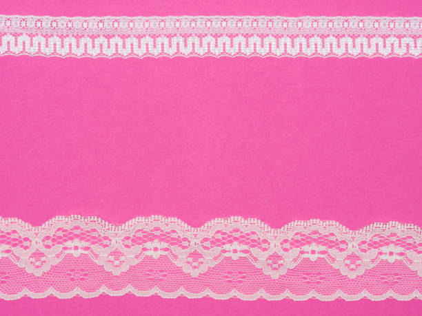 istock White and beige lace on pink background 1163348176