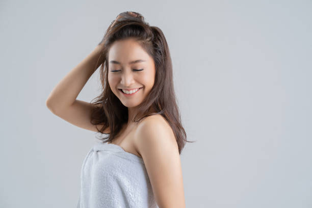 Asian women happy bathing with soap