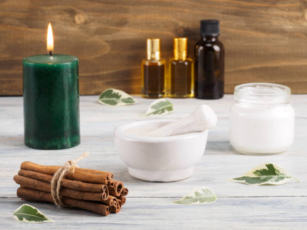 istock Aromatherapy and spa set with candle on a white wooden background 1163348409
