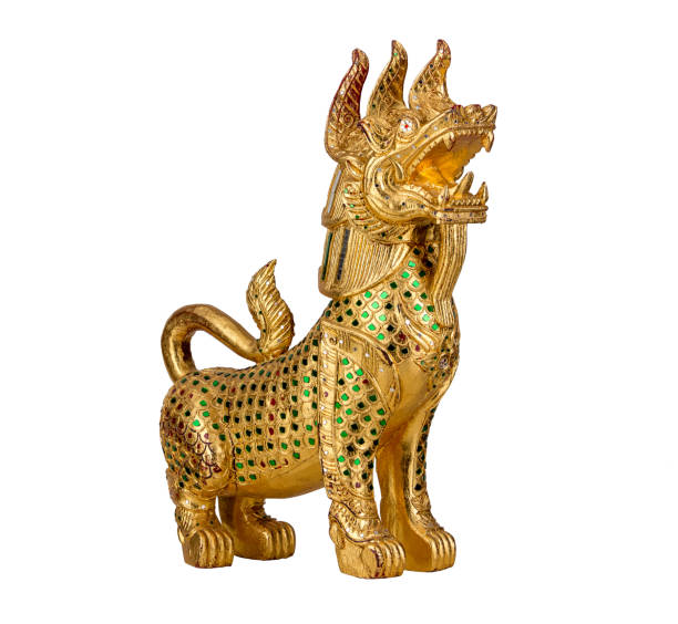 golden lion statue isolated with white background - reindeer christmas decoration gold photography imagens e fotografias de stock