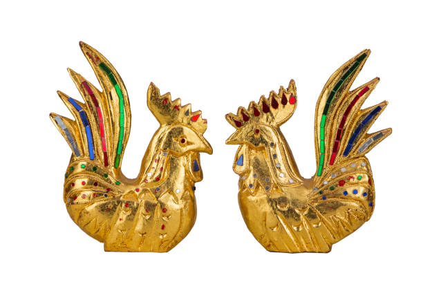 istock Golden chicken statue isolated with white background 1163352407
