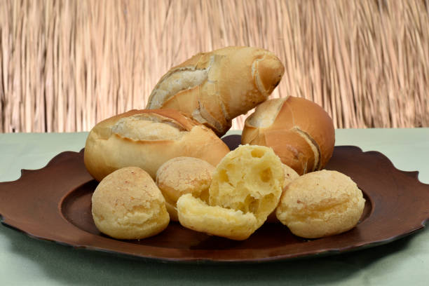 istock french bread and cheese bread on the plate with red background. 1163352750