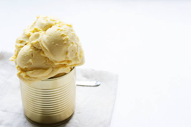 istock Homemade ice cream in an iron jar on a light background 1163353243