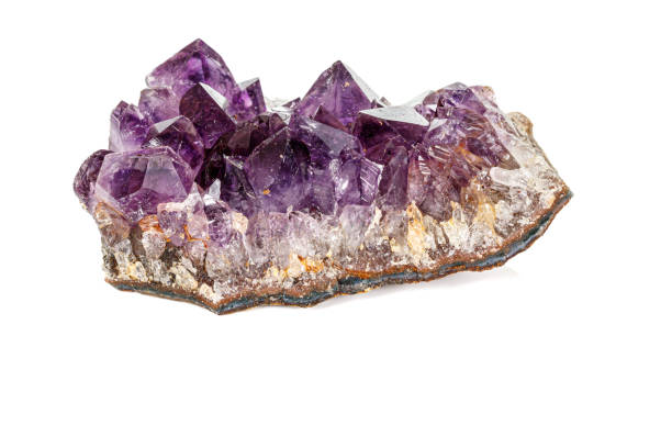 istock Amethyst Crystal Druse  macro mineral on white background 1163361988