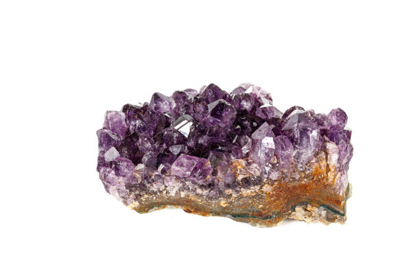 istock Amethyst Crystal Druse  macro mineral on white background 1163362046