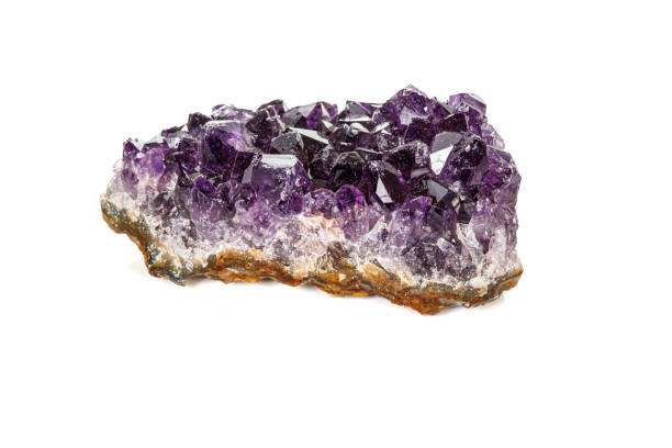 istock Amethyst Crystal Druse  macro mineral on white background 1163362218