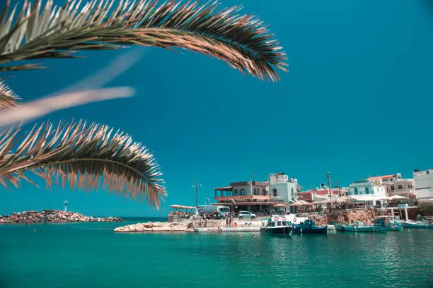 The blue sea waters of Sissi Harbour, Crete, Greece