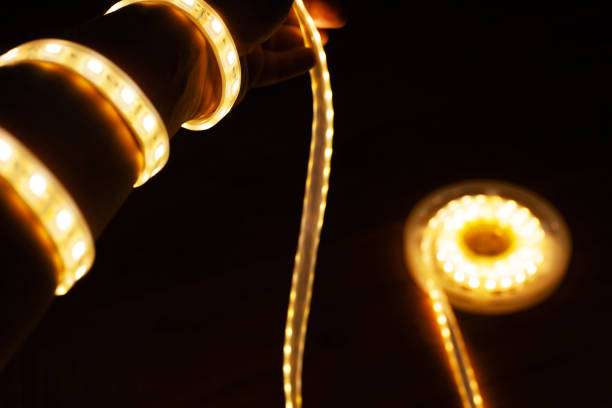 istock LED tape on hand, diode tape wound like a garland 1163365934