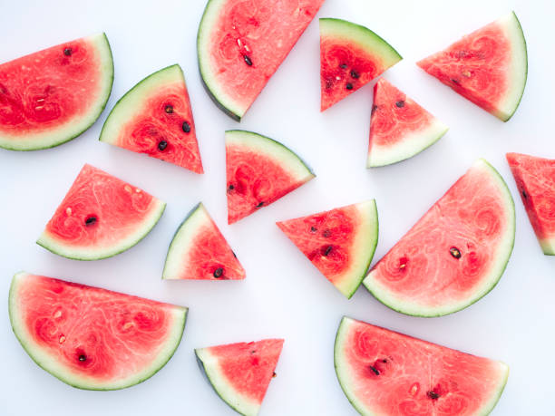 istock Sweet watermelon slices on white background 1163366268