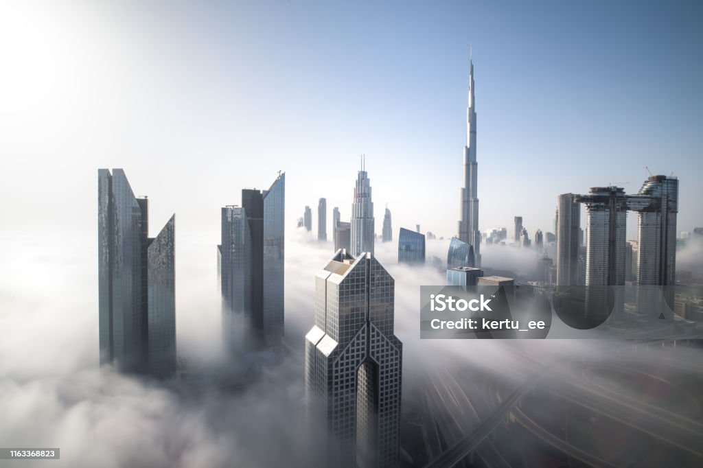 Dubai Downtown skyline on a foggy winter day. Cityscpae of Dubai Downtown skyline on a foggy winter day. Dubai, UAE. Dubai Stock Photo