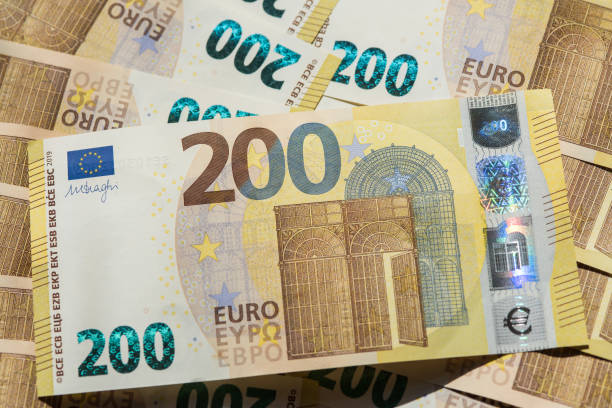 200 euro - currency exchange currency euro symbol european union currency foto e immagini stock