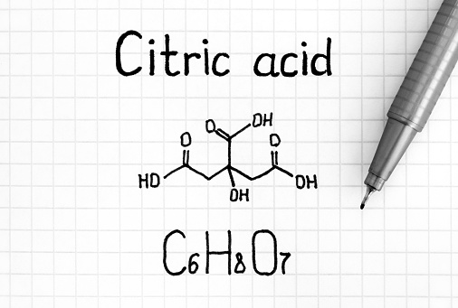 Handwriting Chemical formula of Citric Acid with pen. Close up.