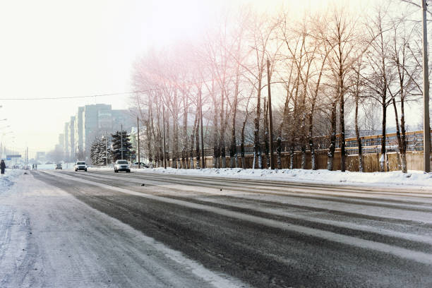 istock road city car winter 1163373562