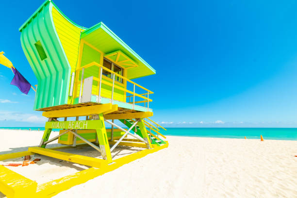 istock Sun shining over a colorful lifeguard tower in Miami Beach 1163375943