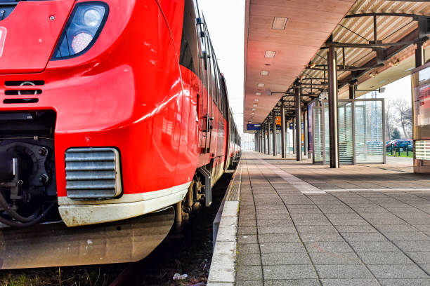 Copenhagen, Denmark - 16 June, 2024: a red DSB passenger train waits to depart at the platform at Copenhagen Central Station in Copenhagen, Denmark.