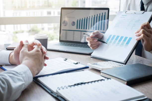 istock Professional executive manager, Business partner discussing ideas marketing plan and presentation project of investment at meeting and analyzing on document data, financial and investment concept 1163383307