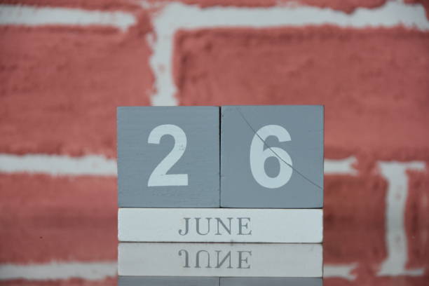 istock June 26 Against a red brick wall 1163387037
