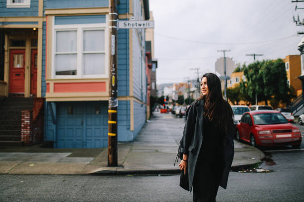 istock Young commuter woman in San Francisco Mission District 1163389791