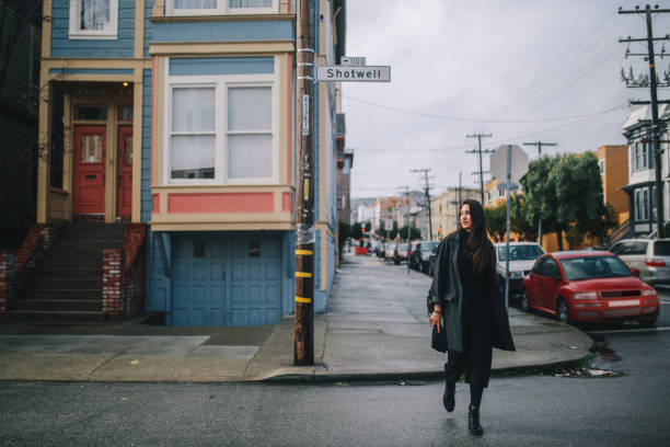 istock Young commuter woman in San Francisco Mission District 1163390296