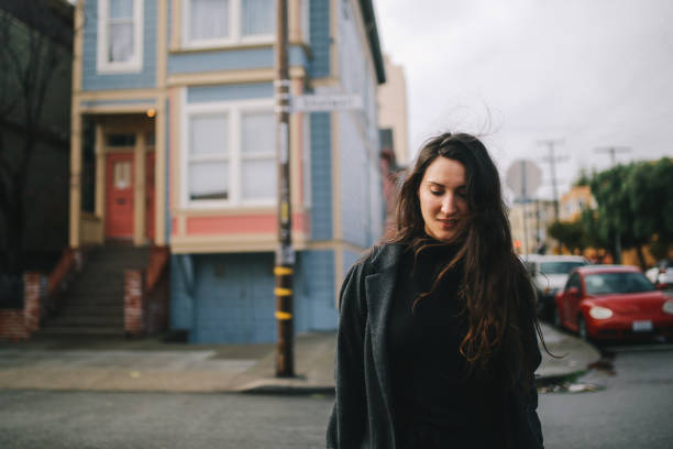 istock Young commuter woman in San Francisco Mission District 1163391381