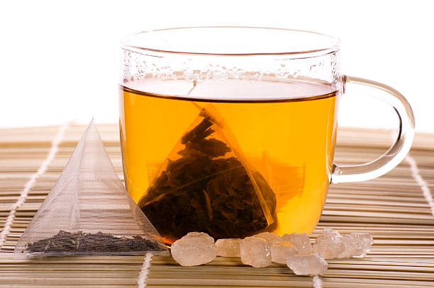 istock white tea, nylon tea-bag and sugar 116339249