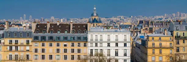 Paris, view of the quai de Bethune on the ile Saint-Louis, panorama of the roofs, with the Saint-Paul church in background