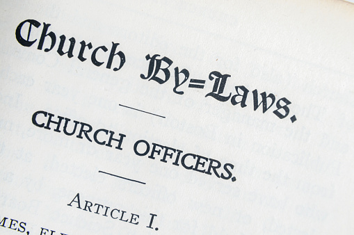 Christian Science church by-laws in the Church Manual by Mary Baker Eddy