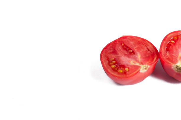 istock A mature red tomato isolated on a white background. vegetables.Copy space. 1163416826